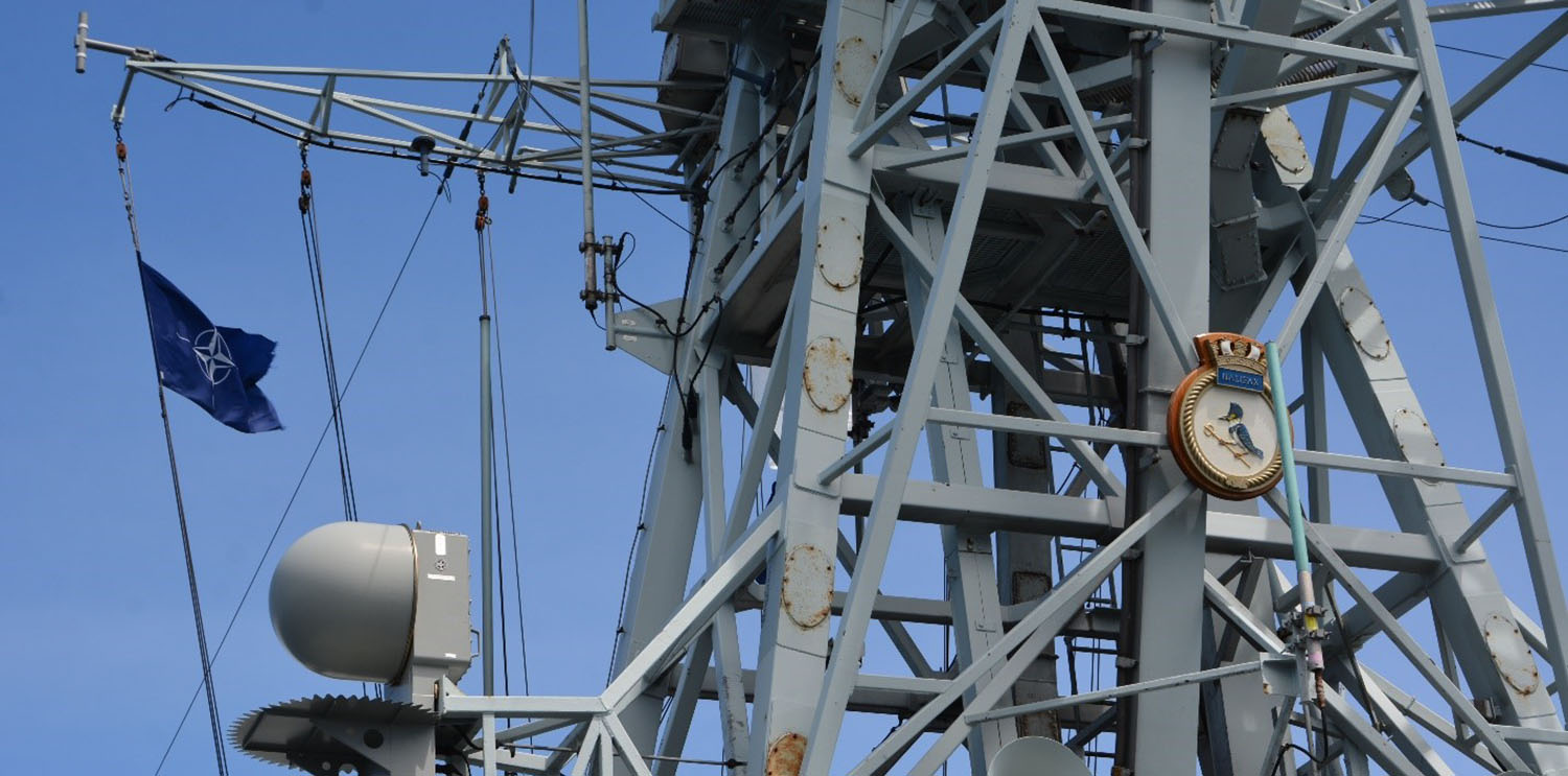 NATO flag in the mast of the HMCS Halifax