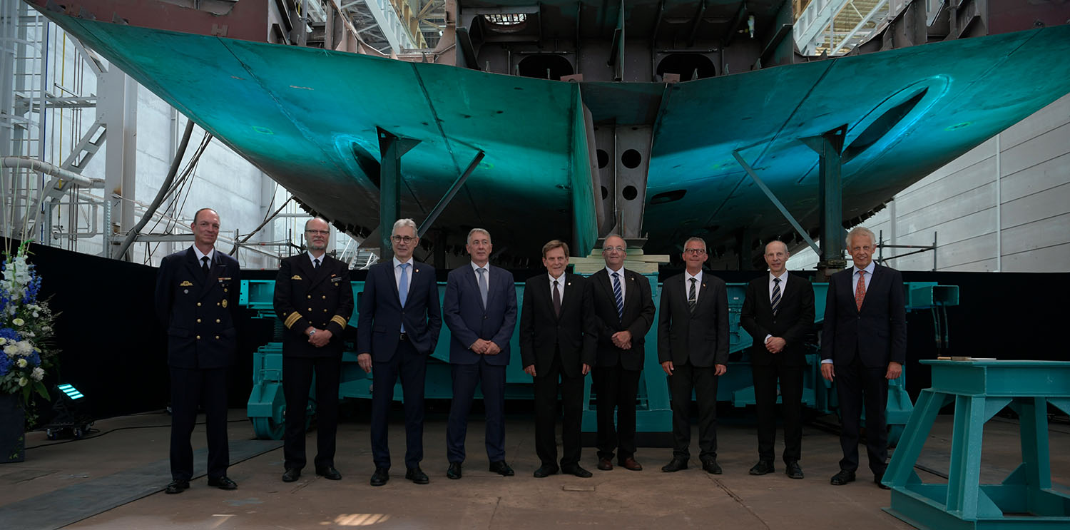 Representatives of the shipyard, navy and sponsor city