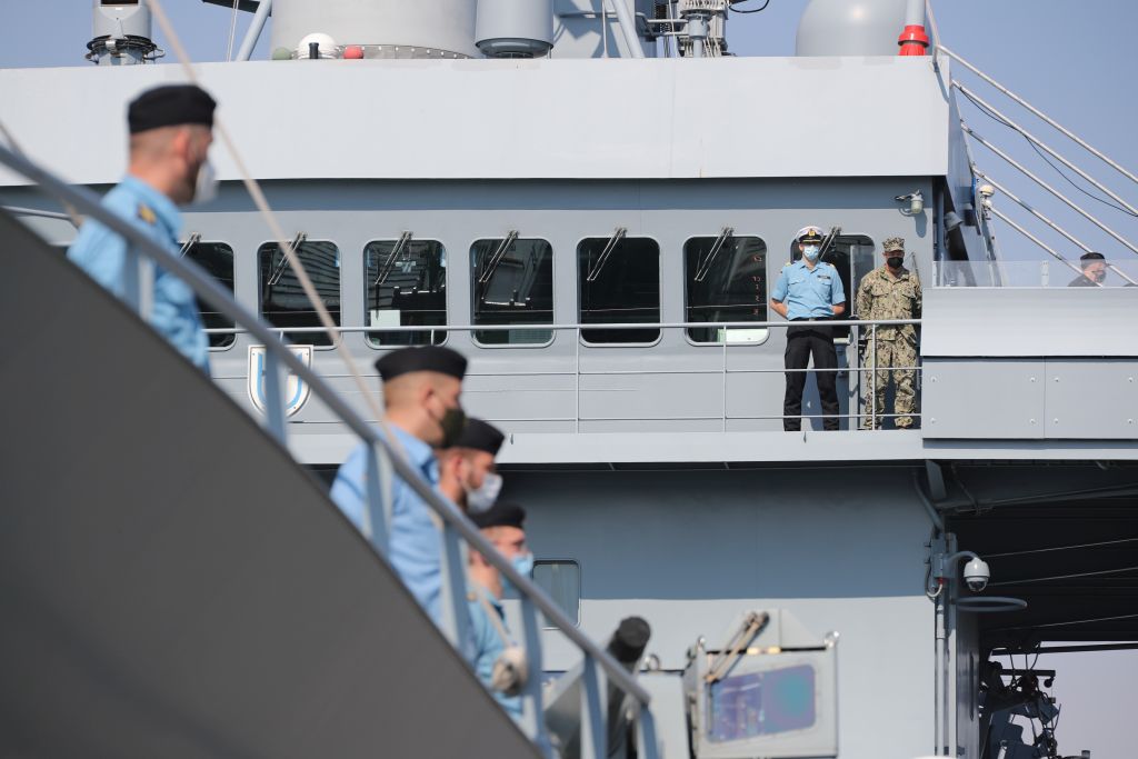 Corvette Captain Sebastian Nacke, commander of the Elbe, and Captain Sam Brasfield on the bridge of the tender